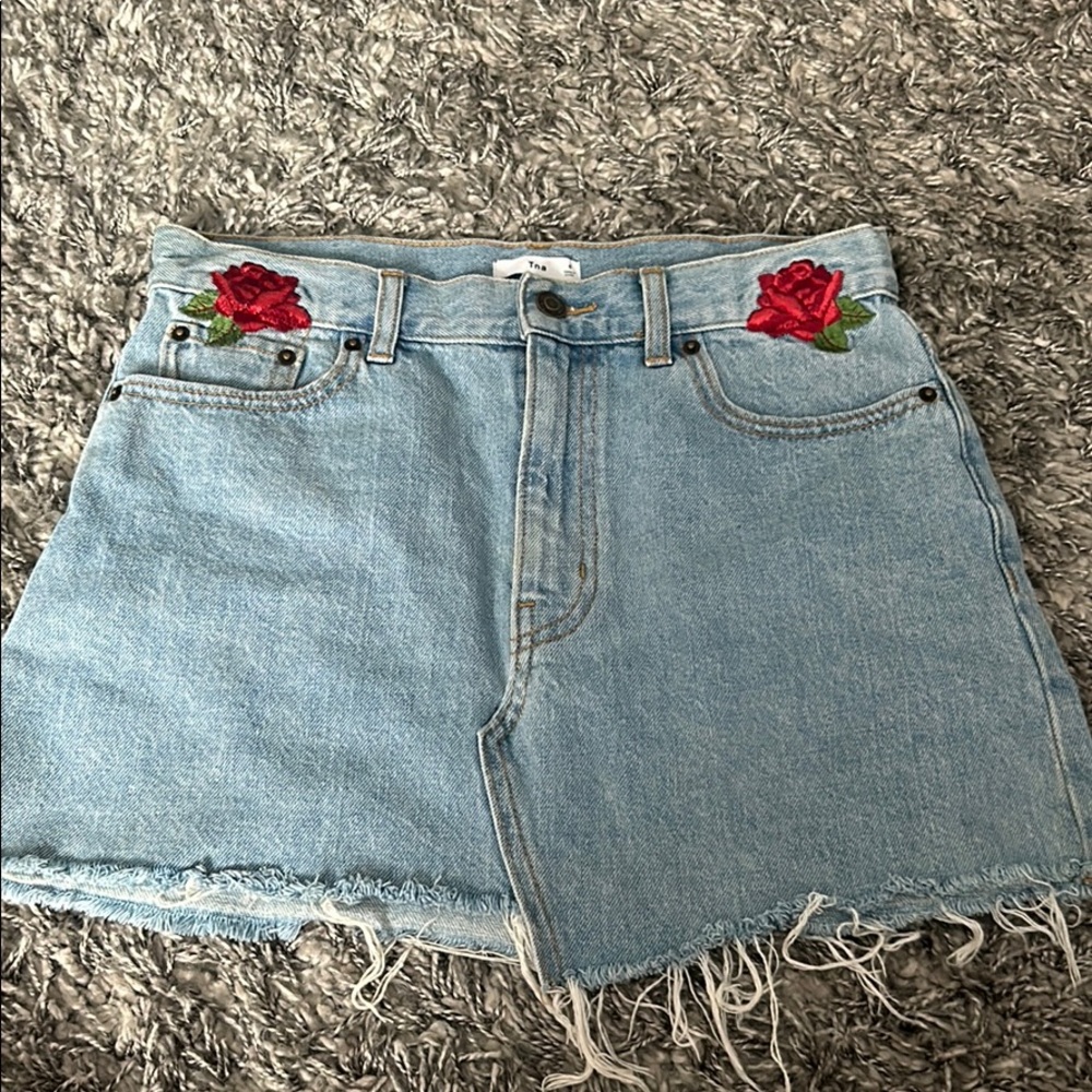 Denim skirt with floral accents